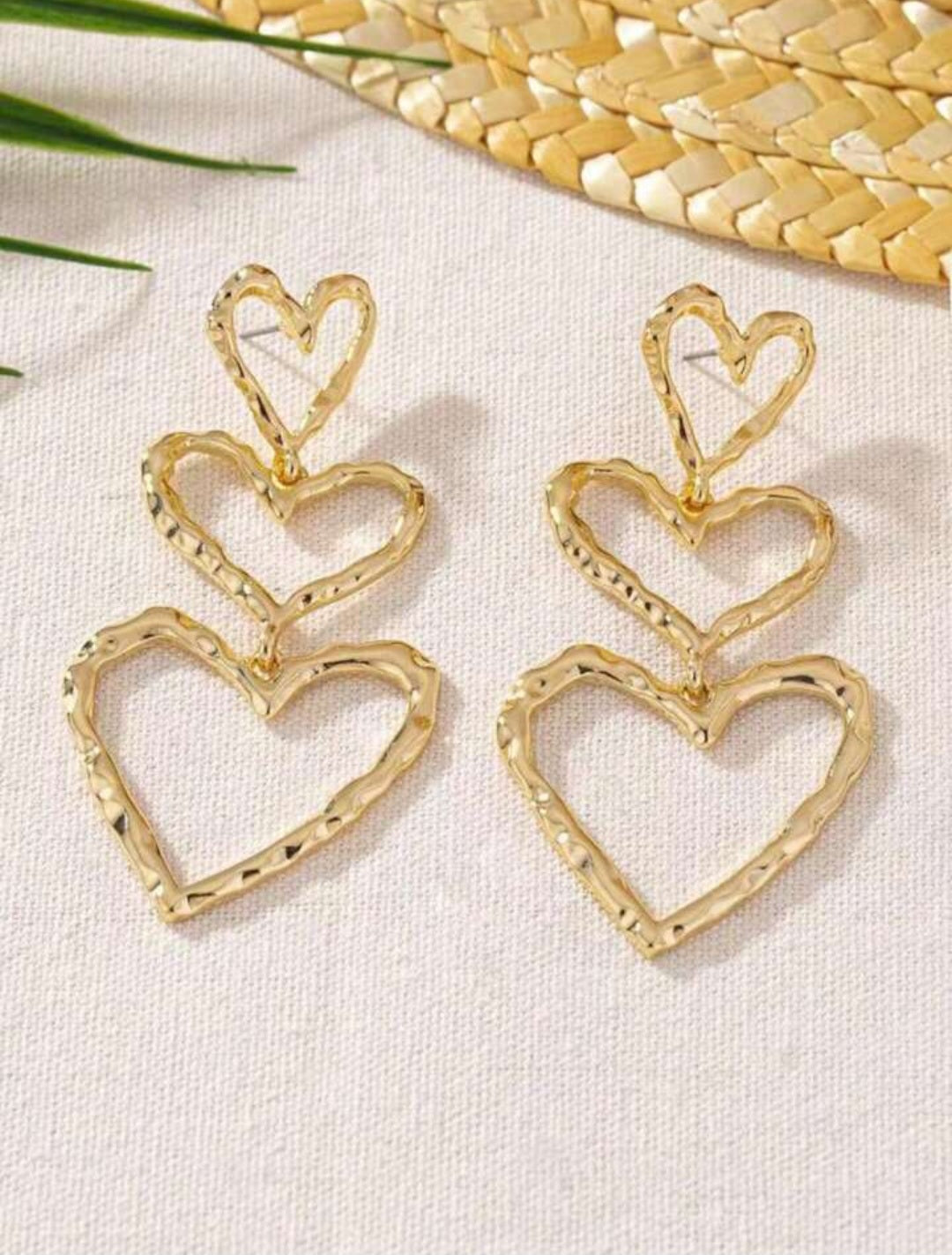 Gold heart dangle earrings